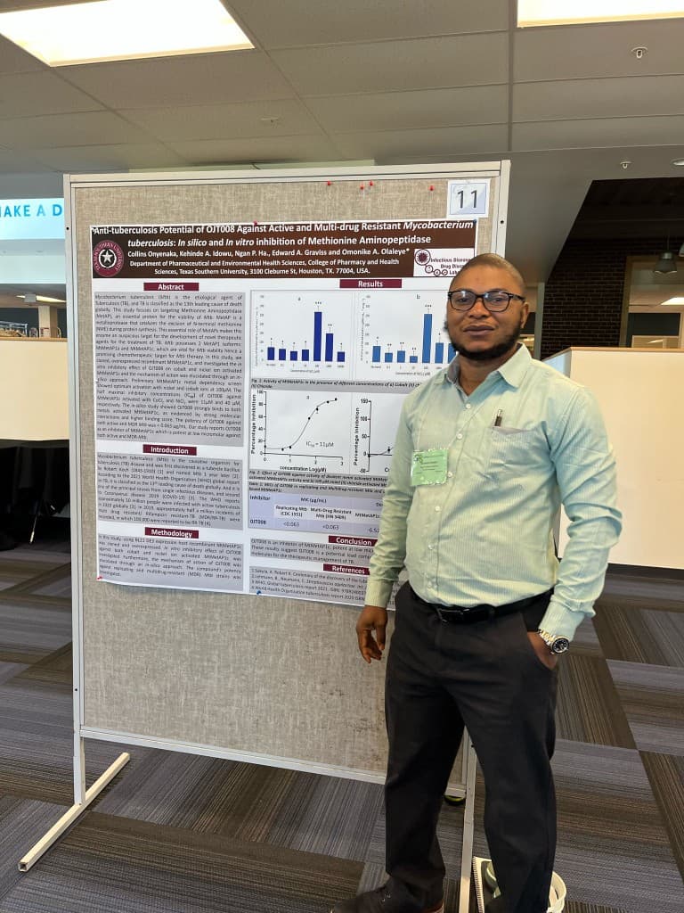Researcher presenting anti-tuberculosis OJT008 methionine aminopeptidase poster