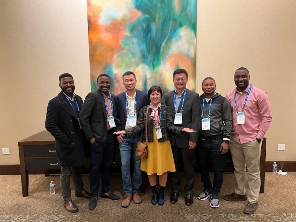 BioRacc collaborators posing together at a professional conference